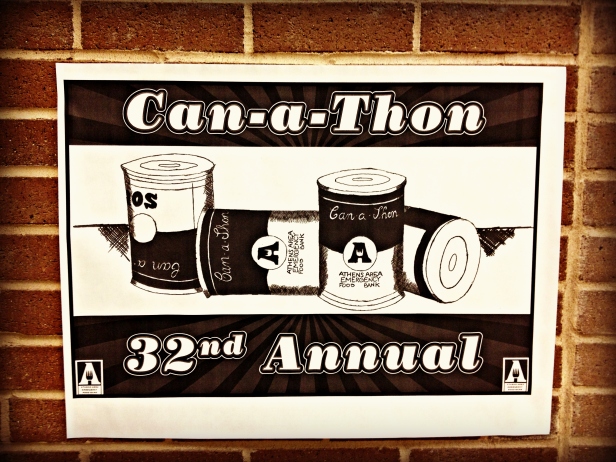 Can-a-thon posters are hanging all around the school as a reminder to bring in cans!